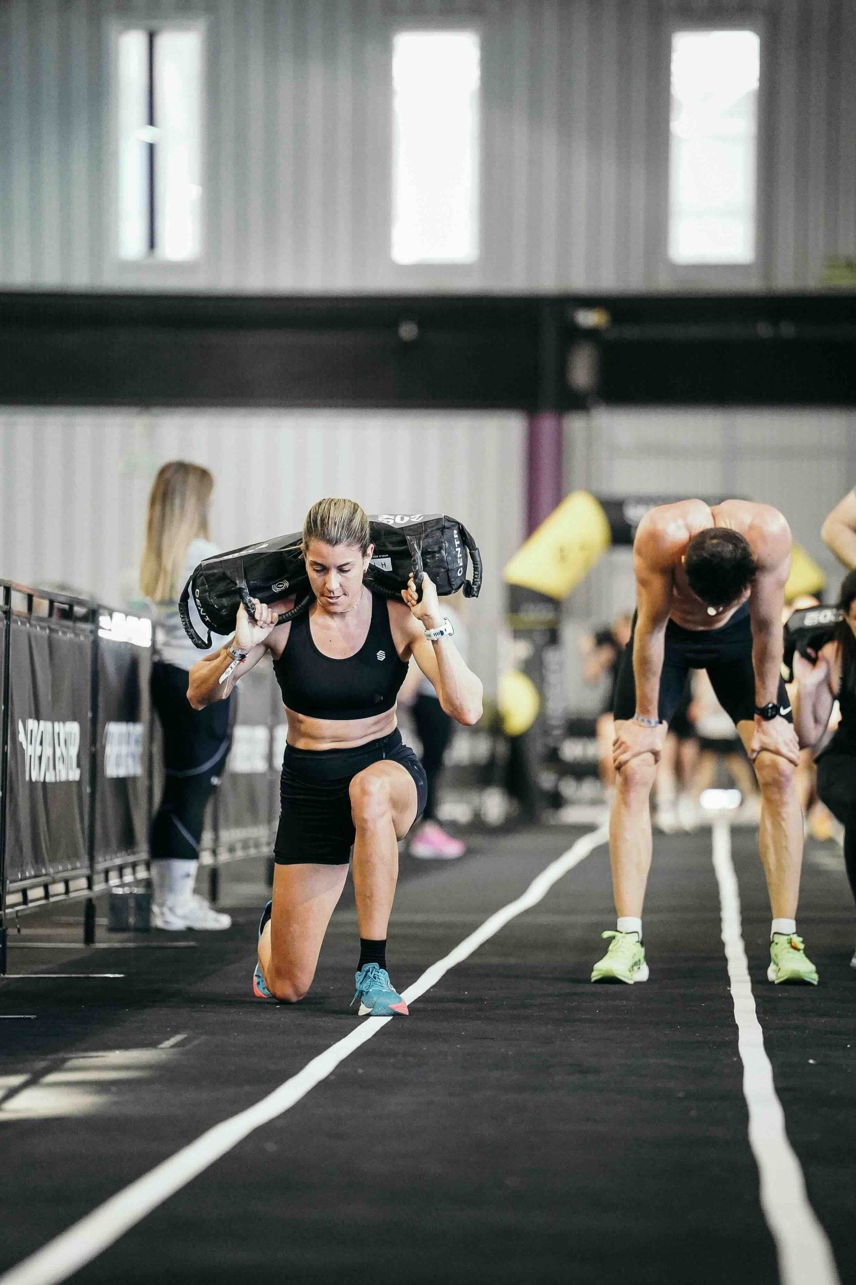 Hyrox mixto en el workout de lunges